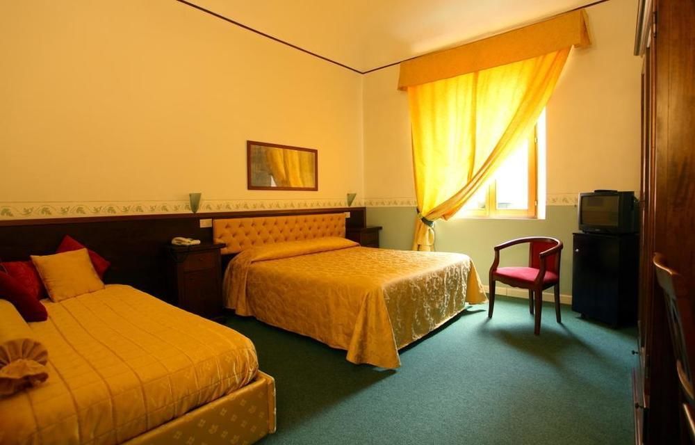 Hotel Minerva Pisa Habitación foto